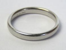 A platinum ring, the D shaped court style wedding band hallmarked for Birmingham, 3mm wide, size P,