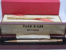 A gold plated Eversharp propelling pencil in box.