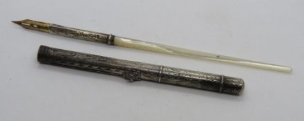 A hallmarked silver and Mother of Pearl