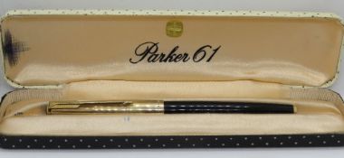 A Parker '61' custom fountain pen, black with gold filled cap, in box, c.1975.
