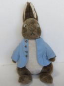 A Beatrix Potter soft toy being Peter Rabbit measuring approx 54cm high.