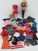 Sindy; Two dolls being Sindy (a/f) and Skipper and a quantity of assorted clothing.