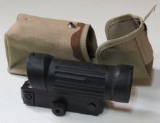 An Elcan 4 x reticle scope with Picatinny mount in US Military pouch.