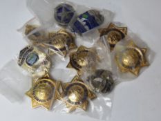 A quantity of U.S. Police badges. Approx 13 items.