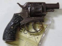 A deactivated Belgian Bulldog Type .22 LR Calibre ten shot revolver with handmade leather holster.