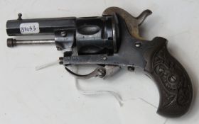An antique Pinfire 6mm Calibre Revolver with fold down trigger.