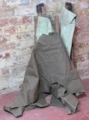 A British camp bed with cover.