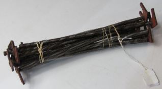 A quantity of UZI recoil springs.