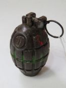 An inert WWII No.36 Mills grenade dated 1944 and marked K to the side and base.