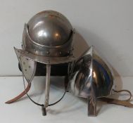 Two contemporary re-enactor's type steel civil war helmets.