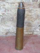 A WWI British 18pr inert shell, case bears British stamp upon and dated 12/15.