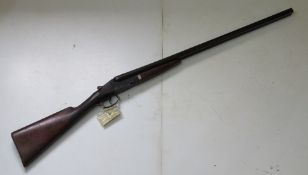 A deactivated English BSA double barrel 12 gauge Boxlock shotgun, with 30 inch barrels.