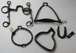 A quantity of assorted militaria inc; stirrups from the 10th, 11th and 12thC,