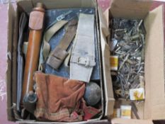 A quantity of assorted militaria inc; velvet case, Parker Hale springs, cleaning rods, brass parts,