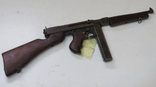 A deactivated Thompson M1A1 SMG, with late war battle sight.