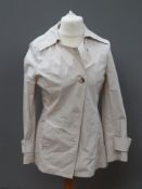 A 98% cotton UK size 12 M&S coat.