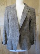 A 90% linen ladies jacket size 16.