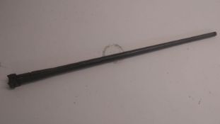 A WWI German MG08 barrel and red leather