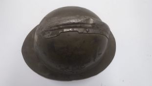 A WWII French Adrian helmet.