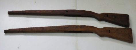 Two K98 rifle wooden stocks.