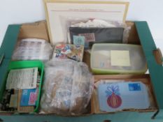A quantity of assorted stamps and ephemera including collectors tin,