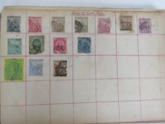 Stamps; an early 20th century album containing various world stamps including Canada 3 cents orange,