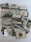 A large quantity of postcards, over 150 items.