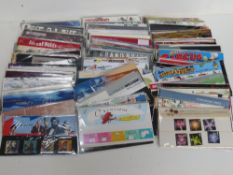 A large quantity of presentation pack stamps, over 100.
