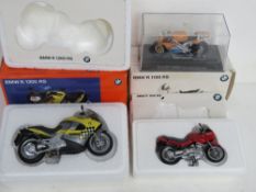 Three scale model motorbikes; Ducati 996R, BMW K 1200 RS and BMW R 1100 RS.