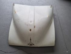 A vintage car bonnet.