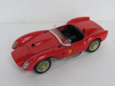 A Burago 250 Ferrari Testa Rossa (1957) 1/18 scale.