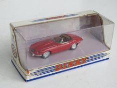 A Dinky Collection 1968 Jaguar E Type Mk1 1/2 in red, original box.
