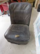A Morris Minor car seat in original condition.