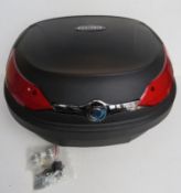 A motorbike lock box with keys and fittings.