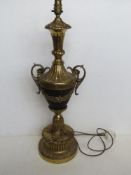 A contemporary brass lamp in the style of a Regency urn, for rewiring.