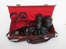 A quantity of camera lenses including two Carl Zeiss Jena.