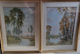 A pair of countryside themed prints, each being riverside theme and in matching frames,