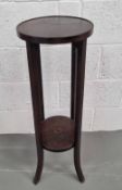 An early 20th century plant stand, approx 30cm dia, 85.5cm high.