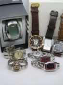 A quantity of contemporary mens and ladies wristwatches including Fossil, DKNY and Adidas.