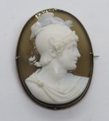 A carved agate cameo brooch, pinchbeck setting, measuring 4.7 x 3.5cm.