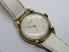 An 18ct gold Doxa antimagnetic wristwatch, marked 750 18k with import hallmark to case back,
