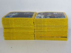 A quantity of National Geographic magazines circa 1990s.