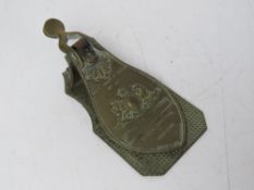 A brass letter clip by Merry, Phipson and Parker's bearing military crest upon.