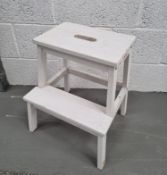 A white painted Ikea step stool.