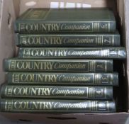 A quantity of The Country Companion magazines in folders.