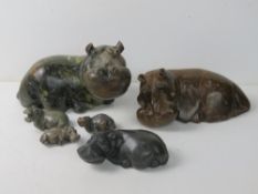 A charming set of six hard stone hippos, largest approx. 29cm wide, smallest 8.5cm wide.