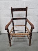 An oak carver chair for re upholstery.