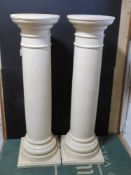 A pair of contemporary pillars painted marble effect (chipped), each standing 114cm high.