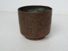 A small copper jardiniere having unusual design in both the Victorian Egyptian revival and Art Deco
