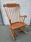 A pine rocking chair.